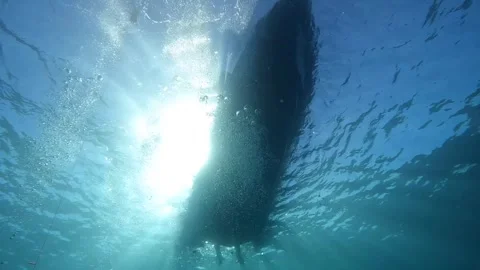 Diver's point of view looking up at a boat from underwater during the Sardi.. Stock Footage 342548663