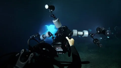 Divers on sandy bottom in the cave, Ustica, Mediterranean sea Stock Footage 126912083
