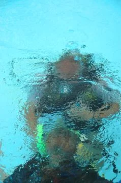 Divers under the water Stock Photos