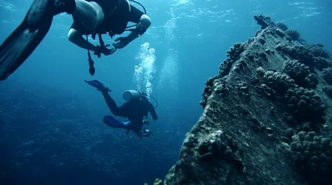 Divers visiting the wreck Giannis D, Red Sea, Sharm el Sheikh, Egypt Stock Footage 68989939