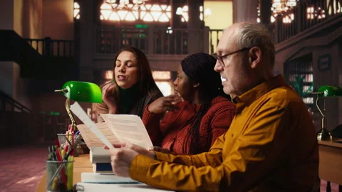 Diverse actors team reading their scripts during theatre drama play rehearsal Stock Footage 313311174