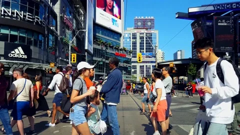 Diverse and Multicultural Group of Pedestrians Start Walk Across Downtown Stock Footage 168828862
