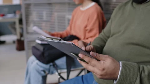 Diverse Applicants Getting Ready for Interview in Consulate Stock Footage 289784948