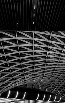 Diverse Architectural patterns forming interior ceiling structure with vert.. Stock Photos