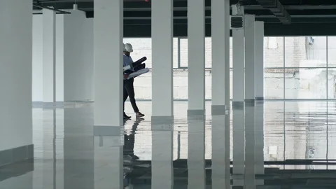 Diverse architectures working on construction object Stock Footage 125709511