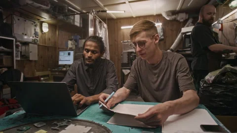 Diverse Artisan Technicians Developing Drafts for New Products Video stock 287548020