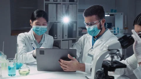 Diverse Biochemistry Students Conducting Experiments at Lab Practice Stock Footage 312382981