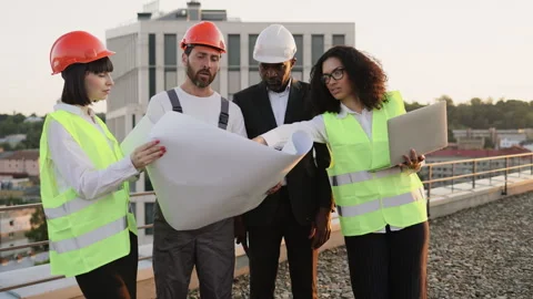 Diverse building engineers brainstorming for common project Stock Footage 246125104