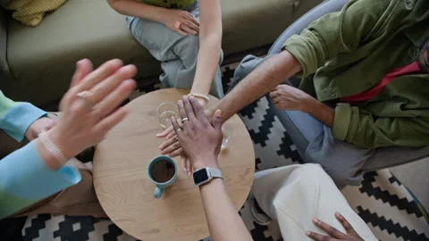 Diverse Business Colleagues Stacking Hands for Teamwork and Unity Stock Footage 338331259