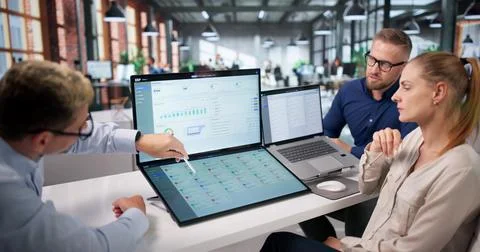 Diverse Business Team Collaborates Using Cloud-based ERP Software. Stock Photos