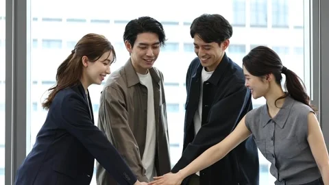 Diverse Business Team Stacking Hands Together for Teamwork and Success Stock Footage 344233186
