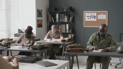 Diverse Cadets Writing During Lecture Class in Military Academy Vídeos de archivo 257797899