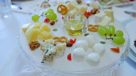Diverse cheese selection featuring blue, hard, and mozzarella varieties Stock Photos