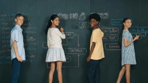 Diverse children planning to code program by using blackboard. Edification. Photos