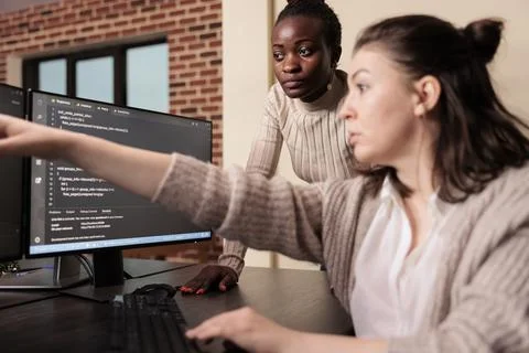 Diverse coders working on terminal window with html script Foto stock