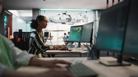 Diverse Colleagues Using Computers In Gamedev Office Stock Footage 255796219