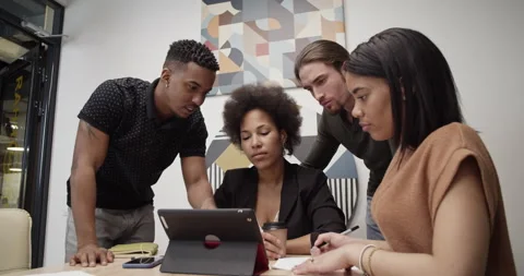 Diverse colleagues working on project together Video stock 195220828