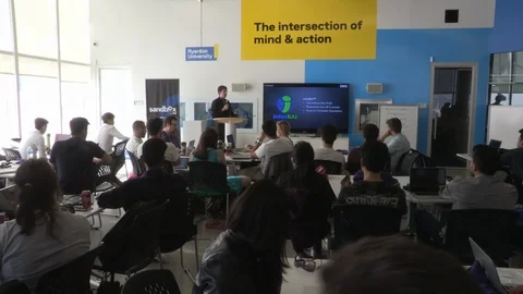 Diverse college and university students at computer programming hackathon coding Stock Footage 90774553