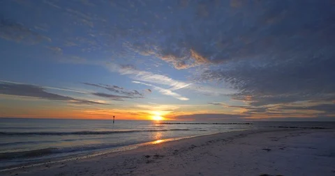 Diverse Couple Embracing on Beach at Sunset, Ocean True Love Marriage 動画素材 105828375