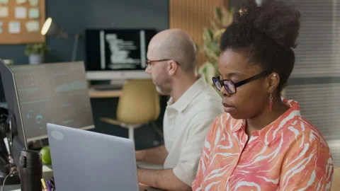 Diverse Coworkers Developing New Software in Open Space Office Video stock 306846994