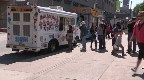 Diverse crowd of tourists line up at ice cream truck in downtown Toronto Stock Footage 50347788