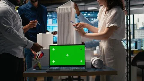 Diverse developers create construction master plan with copy space screen Stock Photos