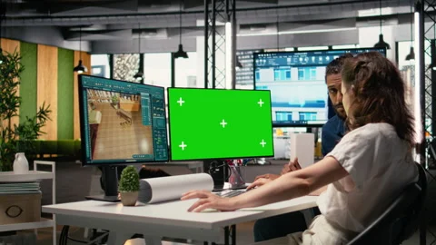 Diverse developers plan architectural structures with isolated screen Stock Footage 316796060