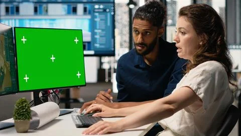 Diverse developers plan architectural structures with isolated screen Stock Photos