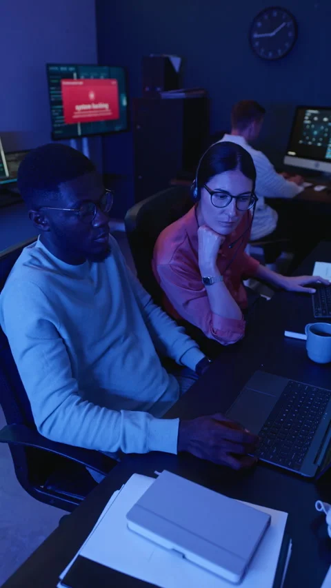 Diverse Engineers Discussing Cyber Attack in Security Office Stock Footage 346817606