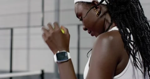 Diverse female competitors bouncing ball, serving then lunging volleying on Видео 343512941