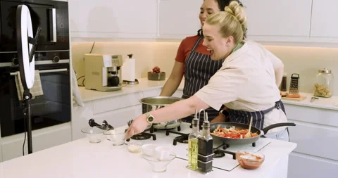 Diverse female friends cooking Stock Video Pond5