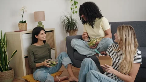 Diverse female friends having fun talking, laughing and enjoying breakfast Stock Footage 307020904