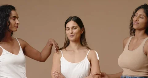 Diverse female models posing on set center woman crossing arms relaxing others Stock Footage 345090800