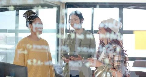 Diverse female team collaborating on coding project, brainstorming ideas on Stock Footage 311495564