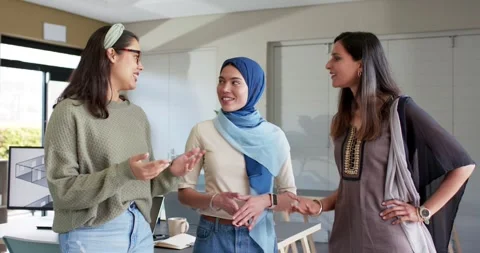 Diverse female team exchanging ideas around 3D layout at office after gesture Stock Footage 335927718