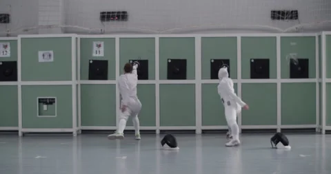 Diverse fencers practicing with targets Stock Footage 224965322