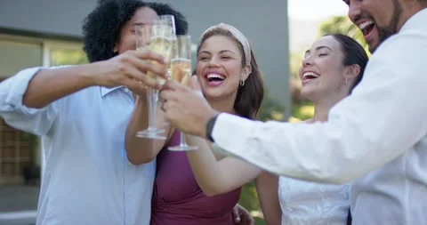 Diverse friends clinking flutes, bride in lace dress initiating toast in Stock Footage 342494512