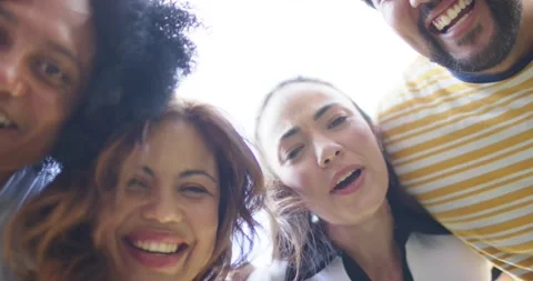 Diverse friends drawing to low camera linking arms, laughing and singing Stock Footage 336175253