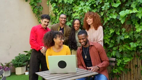 Diverse friends making a group video call outdoors Stock Footage 339087424
