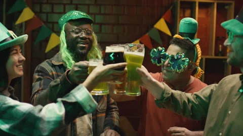 Diverse Friends at Saint Patricks Day Party in Pub Stock Footage 261497837