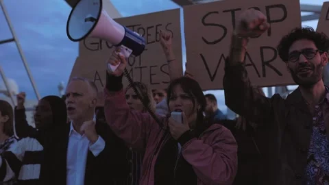 Diverse group of activists people protesting against war and violence. Stock Footage 271285494