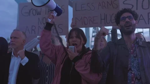 Diverse group of activists people protesting against war and violence. Stock Footage 275722626