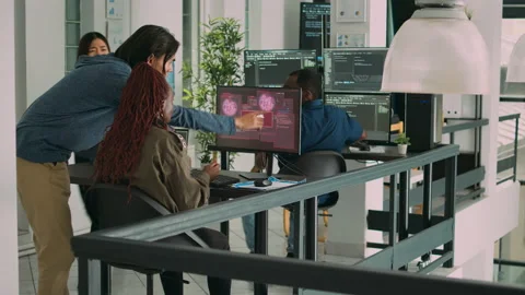 Diverse group of app developers working with hacked computer Stock Footage 220895684