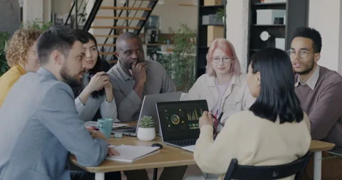 Diverse group of colleagues talking brainstorming working at business Stock Footage 240704475