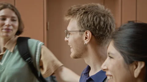 Diverse Group of College Students Chatting Outside Campus Building Stock Footage 342111839