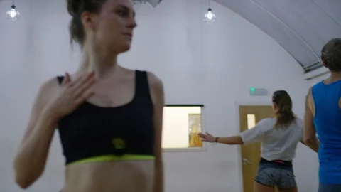 Diverse group of dancers in a studio learning a new dance step, in slow motion Stock Footage 118939707