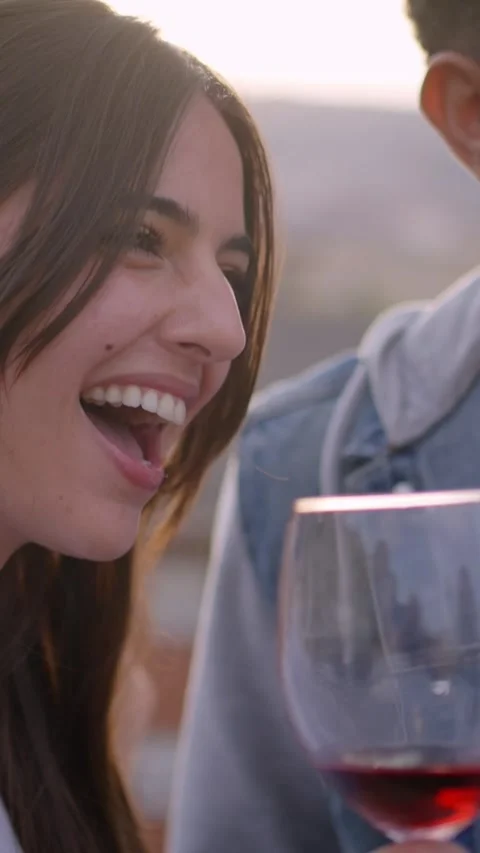 Diverse group of friends dancing and singing celebrating rooftop party at sunset Stock Footage 276296359