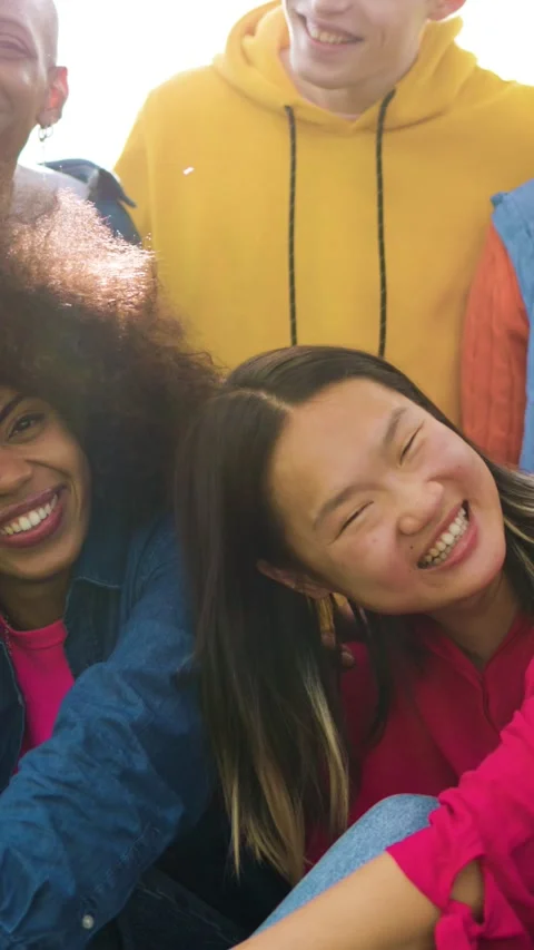 Diverse group of friends having fun smiling outdoor in summer. Vertical video Stock Footage 304834842