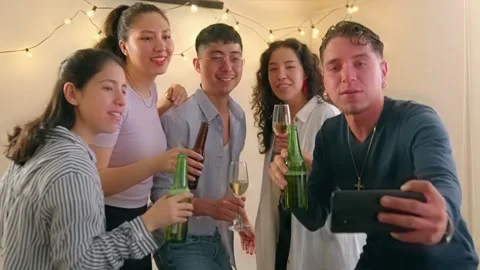 Diverse Group of Latino Friends Capturing a New Year's Eve Selfie Stock Footage 257512997