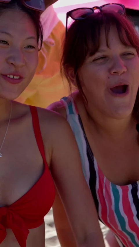 Diverse group of people having fun enjoying summer vacation in the beach Stock Footage 277467980